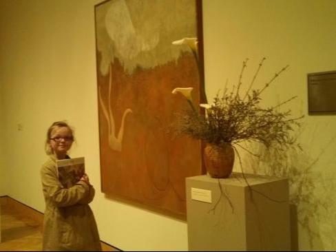 Red Landscape by William Baziotes. Flowers by Thea Adams. Red Landscape by William Baziotes. Flowers by Thea Adams.